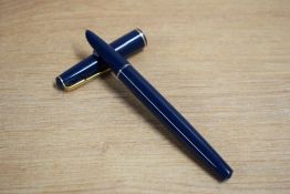 A Parker 17 Standard aerometric fill fountain pen in blue with gold trim bearing original chalk