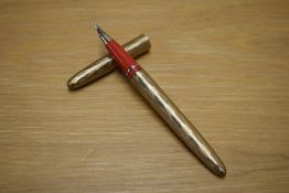 A Sheaffer Lady Skripsert cartridge fill fountain pen in Tulle Gold having Sheaffer Australia nib.