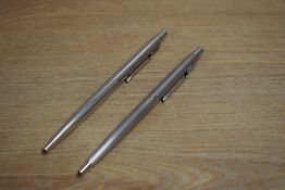 Two Parker 75 ballpoint pens one in Flighter the other chrome