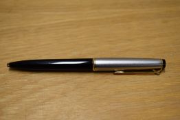 A Montblanc 32S lever clip ballpoint pen in Black and Brushed steel