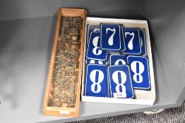 A box containing metal letterpress printing blocks in various sizes (68), sold together with a box