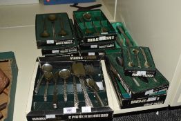12 trays of stainless steel Viners studio cutlery, to include spoons, folks and knives