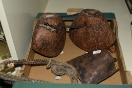 An African leather and iron masai cowbell, L33cm, sold together with a wooden masai cowbell, ( 2 ).