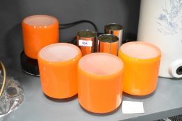 A retro ceiling light having chrome fittings and orange glass shades, L42cm