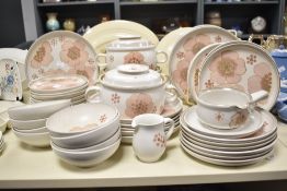 A ceramic Denby 'Gyspy' pattern dinner service, decorated with floral patterns on a white ground, to