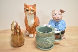 A Babb & Combe ceramic cat sculpture, h21cm, sold together with a Wade piggy bank, a chicken and