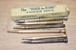 Six Propelling pencils. Three Eversharp gold filled, a Four in Hand four coloured pencil (boxed) and
