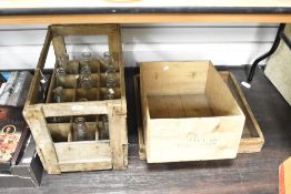 A wooden milk create with glass bottles, L58cm, sold together with two other wooden creates, (3)