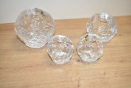 A Kosta Boda 'snowball' candleholder, h9.5cm, sold together with three others, (4)