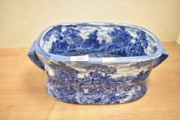 A Victoria wear blue and white ironstone planter having twin handles and decorated with
