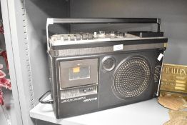 A 1970's Sharp All-in one radio, cassette and Tv system, L44cm