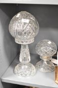 A cut glass crystal mushroom lamp having geometrical patterns and raised on a circular footed