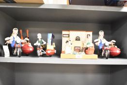A Wallace & Gromit alarm clock, h17.5cm, sold together with three toothbrush holders, (4)