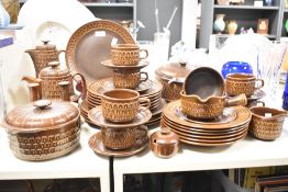 A Wedgwood Pennine pattern tea service, decorated with geometrical patterns on a brown glaze ground,