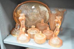 A pair of Art Deco style pink glass candlesticks depicting mermaid figure, h22cm, sold together with