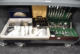A mahogany canteen holding silver plated cutlery, sold together with a silver plated fork set ect
