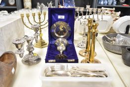 A pair of heavy bronze/ metal candlesticks, h19.5cm, sold together with a silver plated candelabra