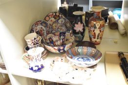 An early 20th century Japanese bowl, having gilt edge and decorated with geometrical patterns, w22.