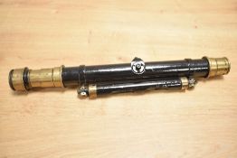 A brass and painted surveyors level, L35cm