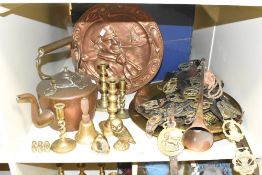 An Art Nouveau style copper charger decorated with male figure, w40cm, sold together with a copper