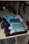 A leather case containing various Masonic regalic, to include two Mason aprons, a sash, a United