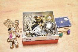 A small collection of costume jewellery, including brooches, statement pieces and paste set items
