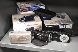 Three boxed digital cameras, to include an Olympus D230, a Sony Cybershot DSC-W320, and a