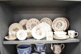 A large collection of Peter Rabbit Wedgwood ceramics, to include Christmas plates, cups and