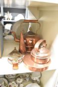 A 19th century copper kettle having shaped handle and spout, h32cm, sold together with a small