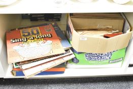 A large quantity of records, to include Christmas Carols from Guilford Cathedral, 50 sing-a-long,