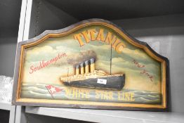 A reproduction Titanic White Star Line wall plaque, L61cm
