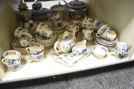 A Masons 'Regency' pattern dinner service decorated with floral patterns on a white ground, to