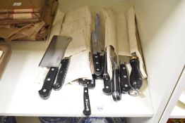 A group of Sabatier stainless steel kitchen / chefs knifes, to include a meat clever ect, (13)