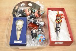 A hand blown art glass Rooster bottle stopper, sold together with an Millefiori style bottle stopper