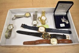 An assortment of wristwatches, including Delta, Ravel and a pair of silver filigree butterfly