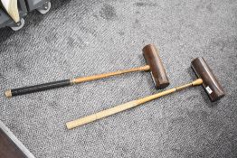 A pair of early 20th century Slazenger 'Corbally' croquet mallets, L77cm, (2).