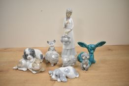 A porcelain figurine of a lady in dress, h24cm, sold together with a Neo dog figure and two