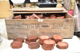A WWII era wooden create containing a large amount of Bodyguard Soap