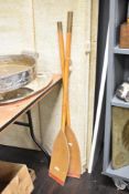 A pair of vintage wooden canoe oars / paddles having brass handles, L120cm