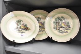 A Clarice Cliff Cotswold Newport pattern oval dish having country scene and gilt edging, w28cm, sold