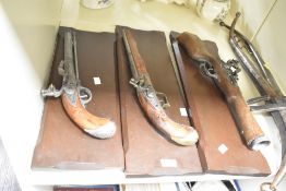 A set of 3 reproduction flintlock pistols, L55cm
