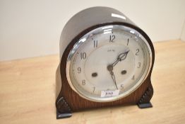An early 20th century Smiths Enfield 8 day mantle clock with key, h19.5cm