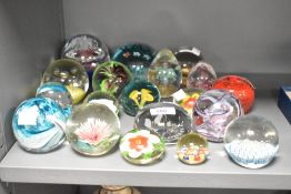 A handmade Caithness glass paperweight having Cancer star sign, signed to base, No.448/1500, w8cm,