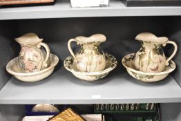 A set of 3 20th century Japanese Satsuma pattern jug and bowls decorated with floral patterns,
