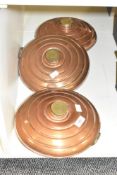 A set of three 19th century copper water bottles, w27cm