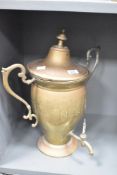 A 20th century brass lidded Samovar having shaped handles, tap and circular base, H42cm
