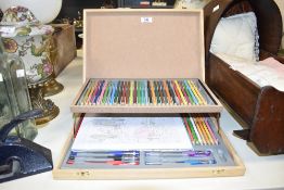 A boxed pencil set, to include 5 Scribblicious pens and a scenic landscape colouring book