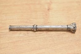 A white metal propelling pencil, having decorative engraving to the body and a banded agate intaglio