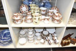 A Wellington China tea service, decorated with gilt edge and floral patterns on a white ground, (