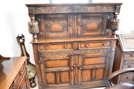 A traditional Titchmarsh and Goodwin oak court cupboard, width approx. 139cm